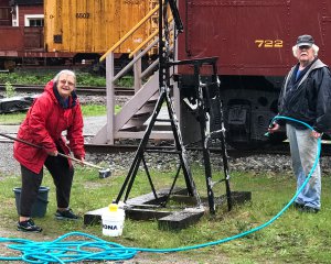 Anna and a Jeremy clean the catch post